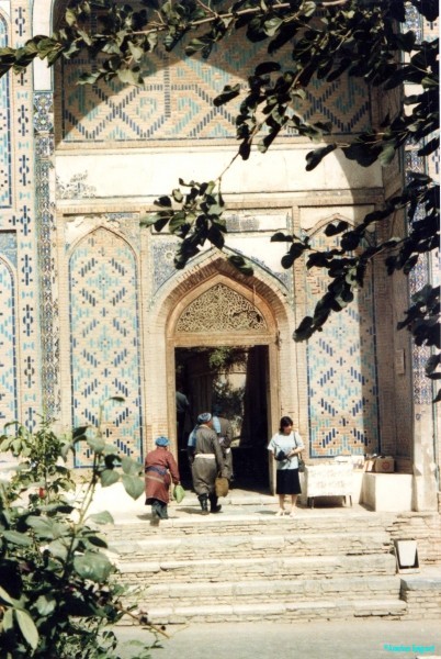 Locals entering mosque, note style of dress