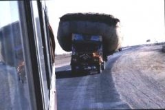 Looking-back-from-minibus-window-an-ambitious-driver-wanting-to-pass-with-a-load-that-takes-up-all-the-road