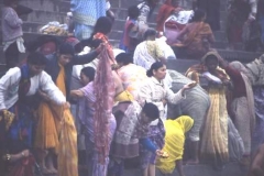 Aarthi ceremony, Rishikesh, India. Small leaf \'boats\' with flowers and candle are set afloat as offerings to Ganga Mai the river goddess.