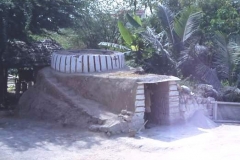Lime kiln, Tamil Nadu. Rocks are piled in the top, wood in the bottom to break down into lime for cement