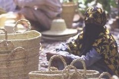 Yemeni woman selling handmade baskets