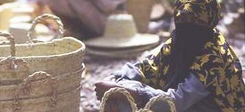 Yemeni woman selling handmade baskets